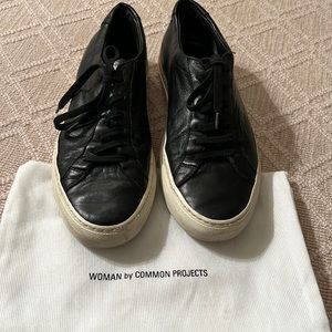 WOMAN by Common Projects Black Sneakers. Size 39.